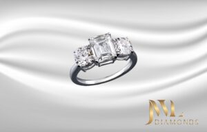 Diamond Ring Emerald center stone with 2 round side Diamonds